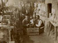 Контролна комисия по качеството на розовото масло в розоварната на търговеца Вл. Блъсков през 1924 г. Георги Чорбаджийски е първият вляво на преден план